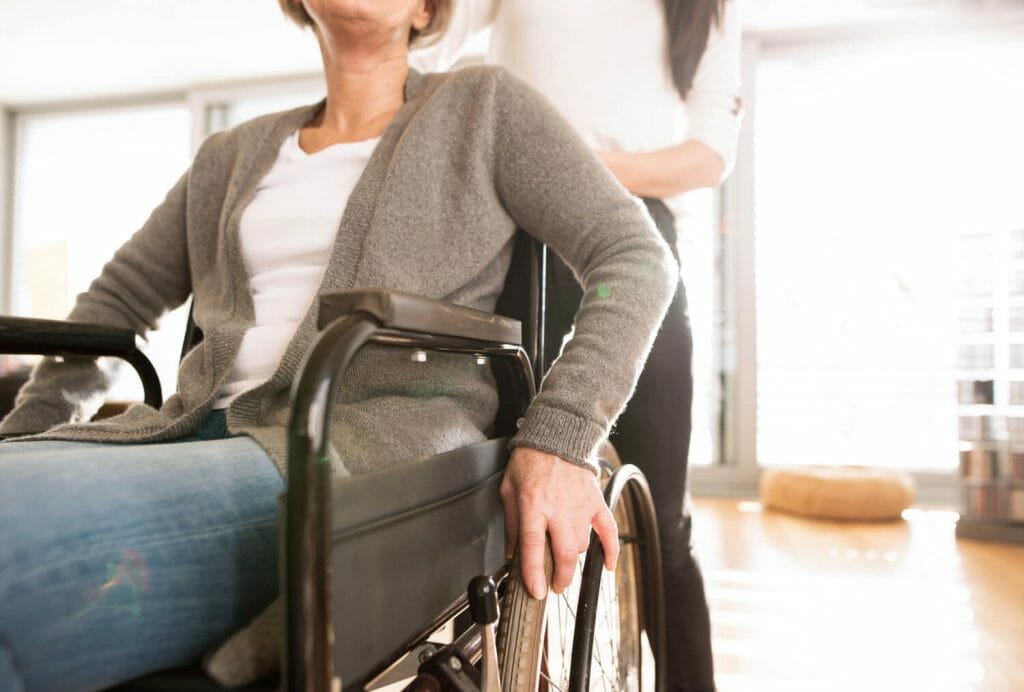 image of disabled woman in a wheel chair